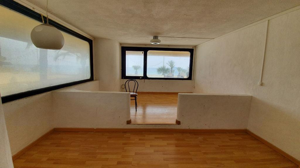 Sjarmerende hus til salgs i Alfaz del Pi med basseng og hage - ditt drømmehus venter!
